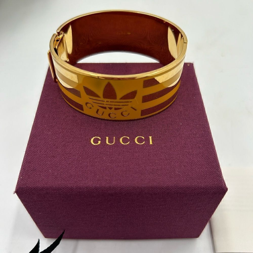 Women’s Gucci X Adidas gold cuff bracelet made in Italy
